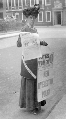 Miss Kelly selling Votes for Women in central London, July 1911. Artist: Unknown