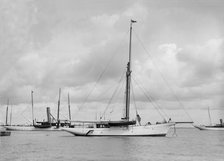 The cutter 'Yolande' at anchor, 1912. Creator: Kirk & Sons of Cowes.