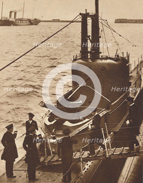'Home Fleet Visit' - King Edward boards submarine Narwhal, 1936 (1937). Artist: Unknown.