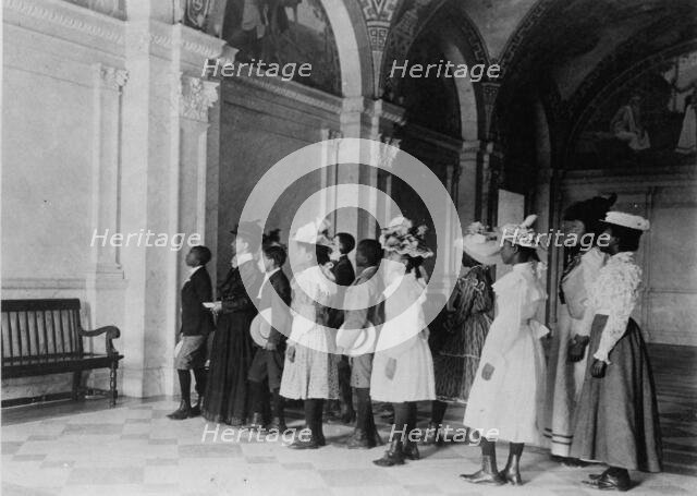 A visit to the Library of Congress, (1899?). Creator: Frances Benjamin Johnston.