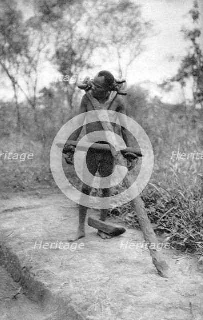 Niam Niam lunatic, Mongalla to Terrakekka, Sudan, 1925 (1927). Artist: Thomas A Glover