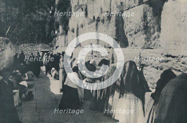 'The Wailing Wall: The Day of Lamentation for the Lost City of their Forefathers', c1935.  Artist: Unknown.