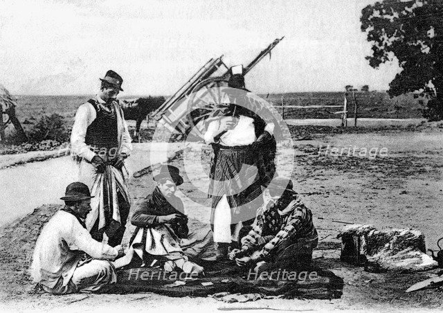 Three men playing cards, Uruguay, c1900s. Artist: Unknown