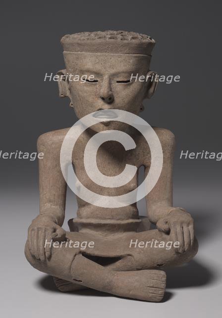 Seated Figure Wearing a Skin, 600-1000. Creator: Unknown.