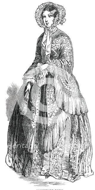 Paris Fashions for June - Promenade Dress, 1850. Creator: Unknown.