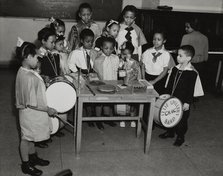 Drum students around a table, 1938. Creator: Unknown.