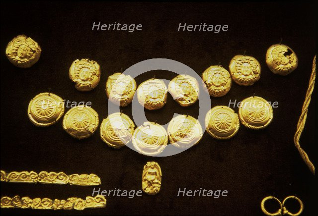 Etruscan gold earrings.