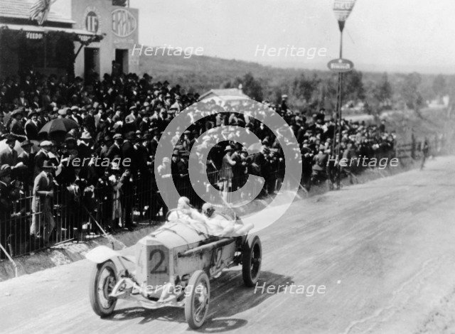 Christian Lautenschlager passing the tribunes, in the Targa Florio race, Sicily, 1922. Artist: Unknown