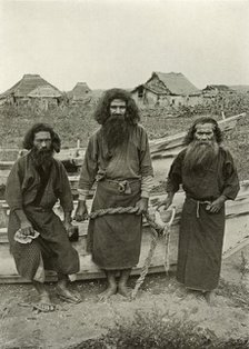 'Happu Konno, The Hunter (In Centre) and Two Ainu Fishermen', 1910. Creator: Herbert Ponting.