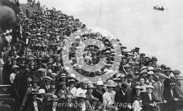 People waiting to go on a boat trip, Bournemouth Pier, August 1921. Artist: Unknown