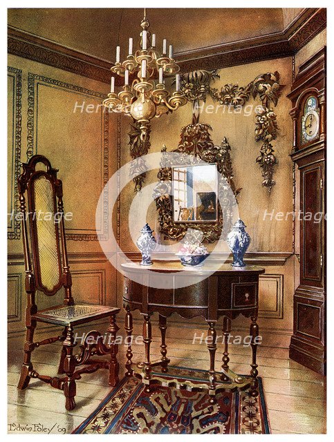 Panelling, mirror frame, walnut table and chair, Charles Wesley's walnut high case clock, 1910.Artist: Edwin Foley