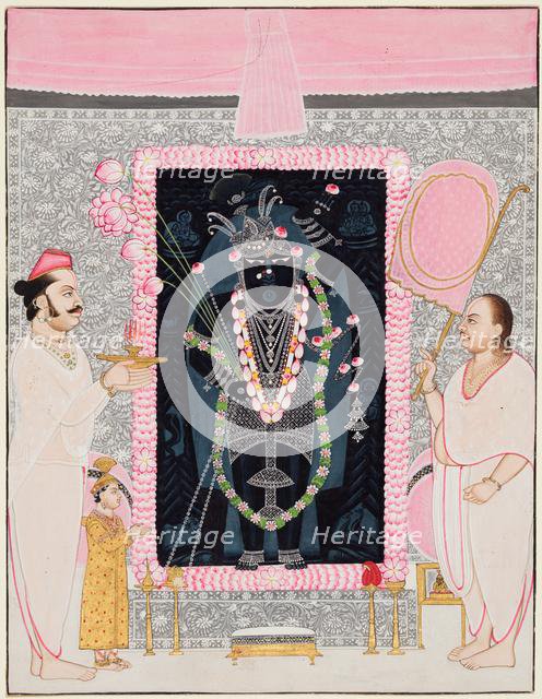 The head priest (Tilakayat) Govardhanlalji makes offerings to Shri Nathji in celebration..., c. 1890 Creator: Ghasiram Hardev Sharma (Indian, 1866-1930), attributed to.