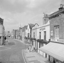 A street view looking from Battersea High Street towards Battersea Church Road, 1962-1964. Creator: John Gay.