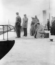 Passengers waiting to board a freighter at the locks at Sault Sainte Marie, Michigan, 1903. Creator: Frances Benjamin Johnston.