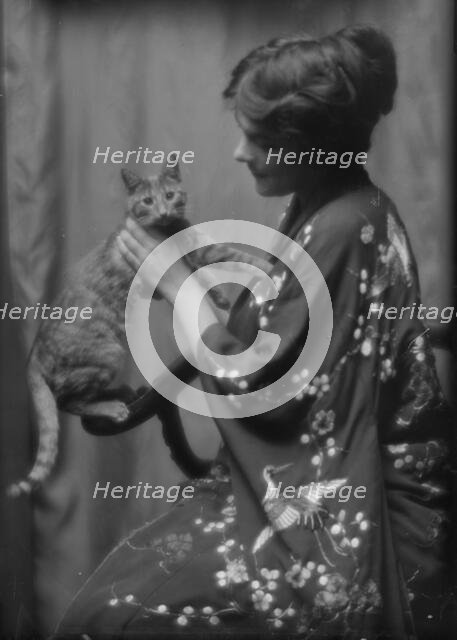 Warren, Gertrude, Miss, or Miss Jackman, with Buzzer the cat, portrait photograph, 1912 or 1913. Creator: Arnold Genthe.
