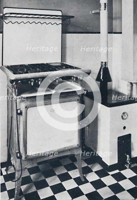 'Ideal Boilers & Radiators Ltd. - In black and white or grey mottled, this gas boiler is vitreous en Artist: Unknown.