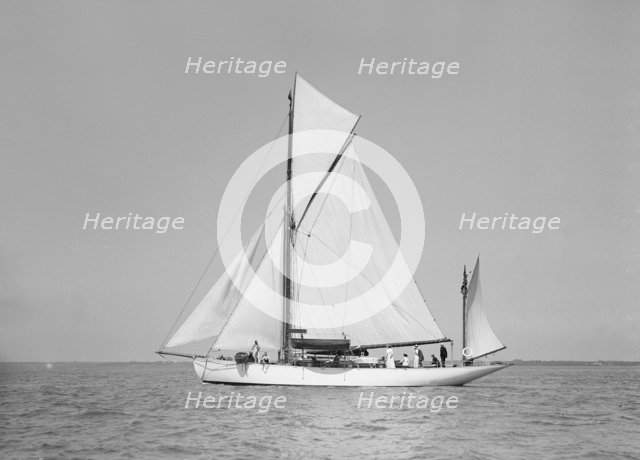 The yawl 'Suzanne' under sail, 1911. Creator: Kirk & Sons of Cowes.