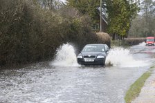 Skoda driving fast through floodwater at Beaulieu 2008. Artist: Unknown.
