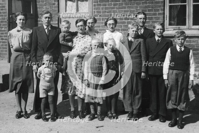 Swedish dairy farmer Axel Nilson with his wife and children, 20 May 1941. Artist: Otto Ohm