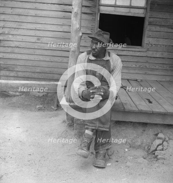 Father of sharecropper family, Person County, North Carolina, 1939. Creator: Dorothea Lange.