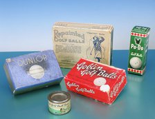Golf ball boxes and tin of golf ball paint, 1920-1930. Artist: Unknown