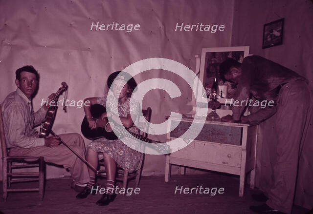 Orchestra during intermission at square dance, McIntosh County, Oklahoma, 1939 or 1940. Creator: Russell Lee.