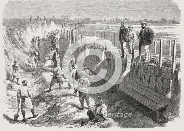 Construction of the Ismailieh fresh water canal, train for levelling the margin, Egypt, February …