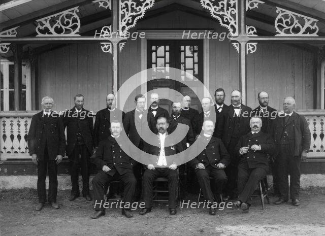 Judges, sheriffs and jurors gathered outside the courthouse for Västra Härad's trial...1900. Creator: Unknown.