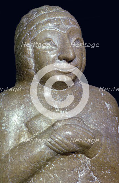 Detail of a limestone statue of a woman, about 2500 BC, from Tello (ancient Girsu),Southern Iraq. Artist: Unknown