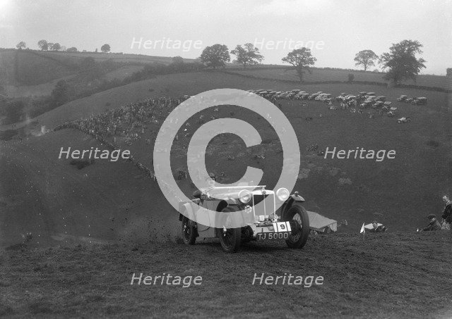 Cream Cracker Team MG PA of JM Toulmin at the Singer CC Rushmere Hill Climb, Shropshire 1935. Artist: Bill Brunell.