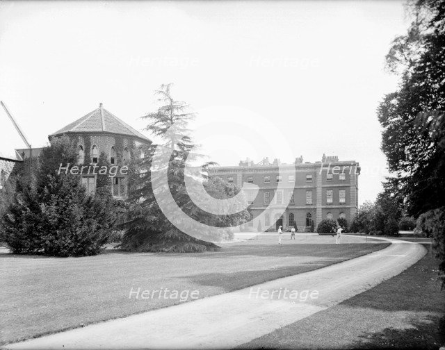 Students playing tennis on the lawn, Radley College, Radley, Oxfordshire, c1860-c1922. Artist: Henry Taunt
