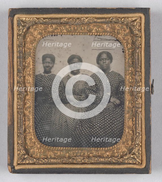 Ambrotype of three women in dotted calico dresses, 1850-1870. Creator: Unknown.