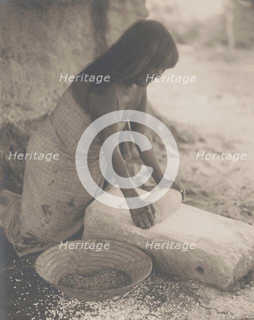 Maricopa Woman Mealing, 1907 Creator: Edward Sheriff Curtis.