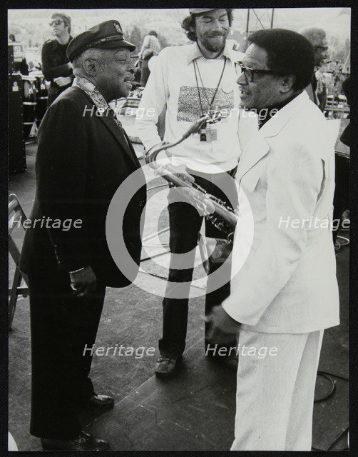 Count Basie chatting with Illinois Jacquet at the Capital Radio Jazz Festival, London, July 1979. Artist: Denis Williams