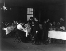 Students having a meal, Western High School, Washington, D.C., (1899?). Creator: Frances Benjamin Johnston.