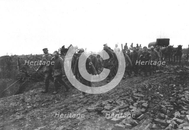'La Bataille de la Somme; a l'arriere de la bataille: prisonniers rapportant dans nos..., 1916. Creator: Unknown.