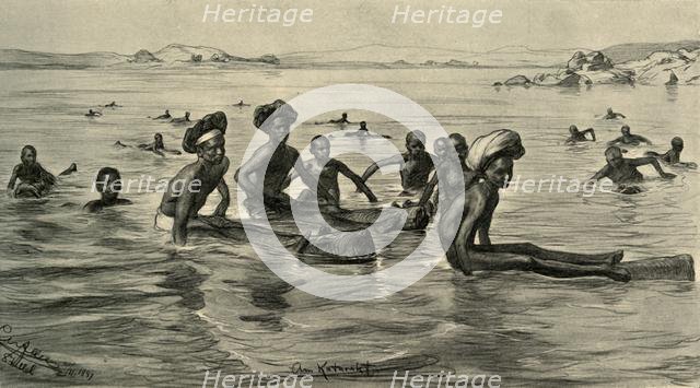 Men in the River Nile at the First Cataract, Egypt, 1898.  Creator: Christian Wilhelm Allers.