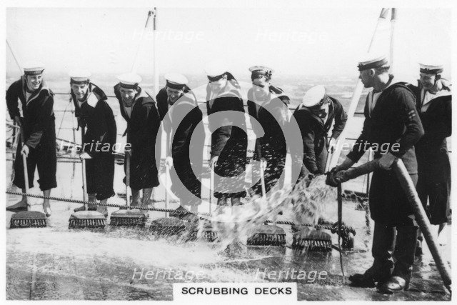 Scrubbing the deck on board HMS 'Nelson', 1937. Artist: Unknown