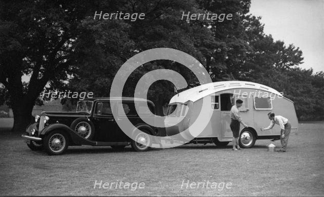 1936 Austin Twenty with caravan. Creator: Unknown.