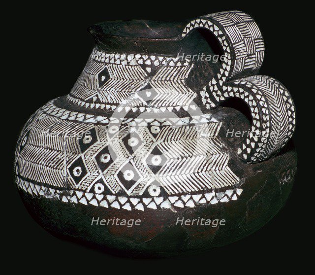 Celtic jug with double handles and volute decorations, 8th century BC. Artist: Unknown
