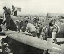 Refuelling and re-arming Spitfire fighters, Malta, World War II, 1942 (1944). Creator: Unknown.