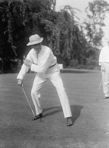 Hitchcock, Gilbert Monell, Rep. from Nebraska, 1903-5, 1907-11; Senator, 1911-23 playing golf, 1917. Creator: Harris & Ewing.