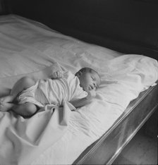 Young baby born on the Delta cooperative farm, Hillhouse, Mississippi, 1937. Creator: Dorothea Lange.