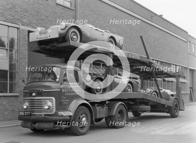 Daimler Dart SP250s on car transporter for delivery 1960. Creator: Unknown.