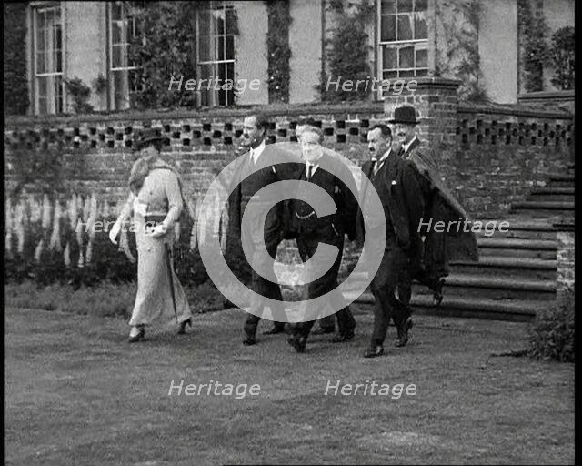 Stanley Baldwin, the British Prime Minister Walking from Himley Hall with Others, 1930s. Creator: British Pathe Ltd.