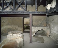 Wine shop, House of Neptune and Amphitrite, Herculaneum, Italy, 2002. Creator: LTL.