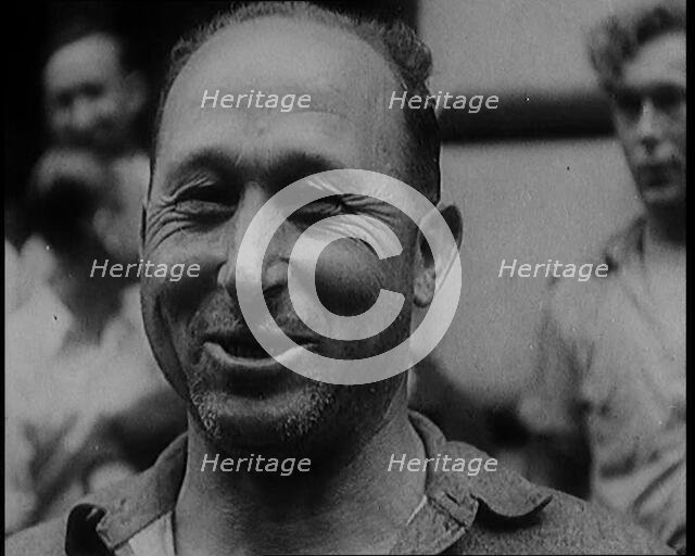 Alcohol Smugglers Coming Out of Court, 1929. Creator: British Pathe Ltd.