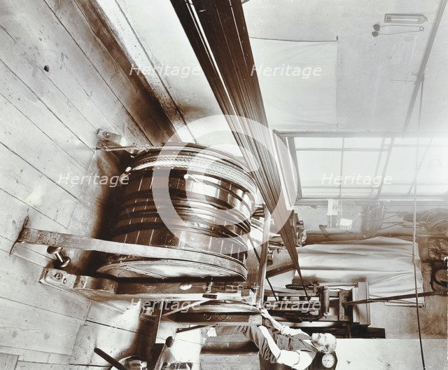 Spitalfields silk weaving industry, Alma Road, Bethnal Green, London, 1909. Artist: Unknown.