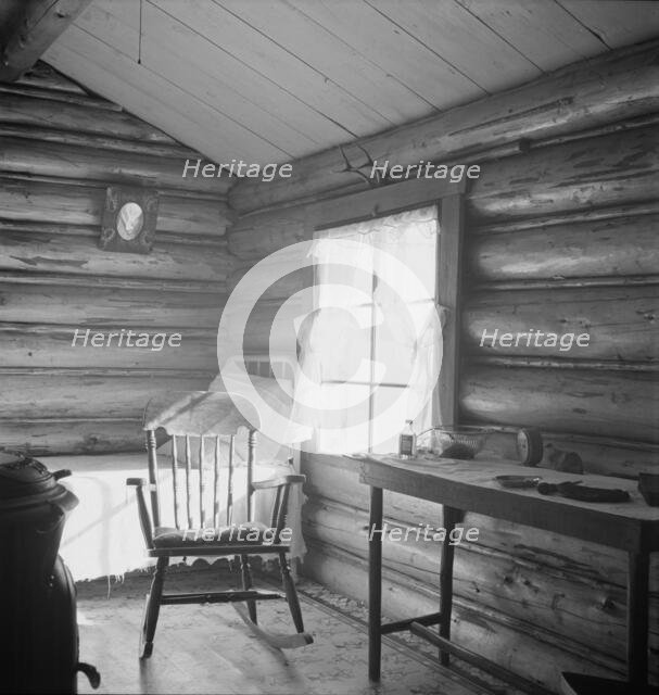 Possibly: Interior of farmer's two-room log home, FSA borrower, Boundary County, Idaho, 1939. Creator: Dorothea Lange.