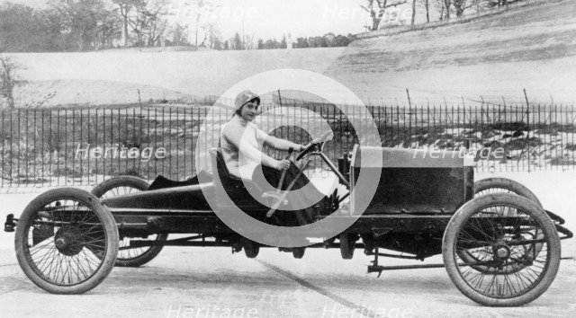 Miss Dorothy Levitt, in a 26hp Napier, Brooklands, 1908. Artist: Unknown